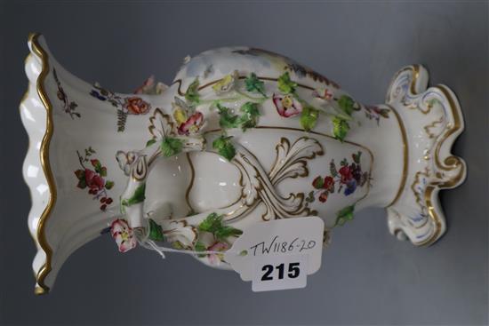 A late 19th century English bone china double handled vase, encrusted with flowers and having frilled rim heightened in gilt, topograph